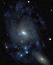 Two bright spiral galaxies seen by the SDSS